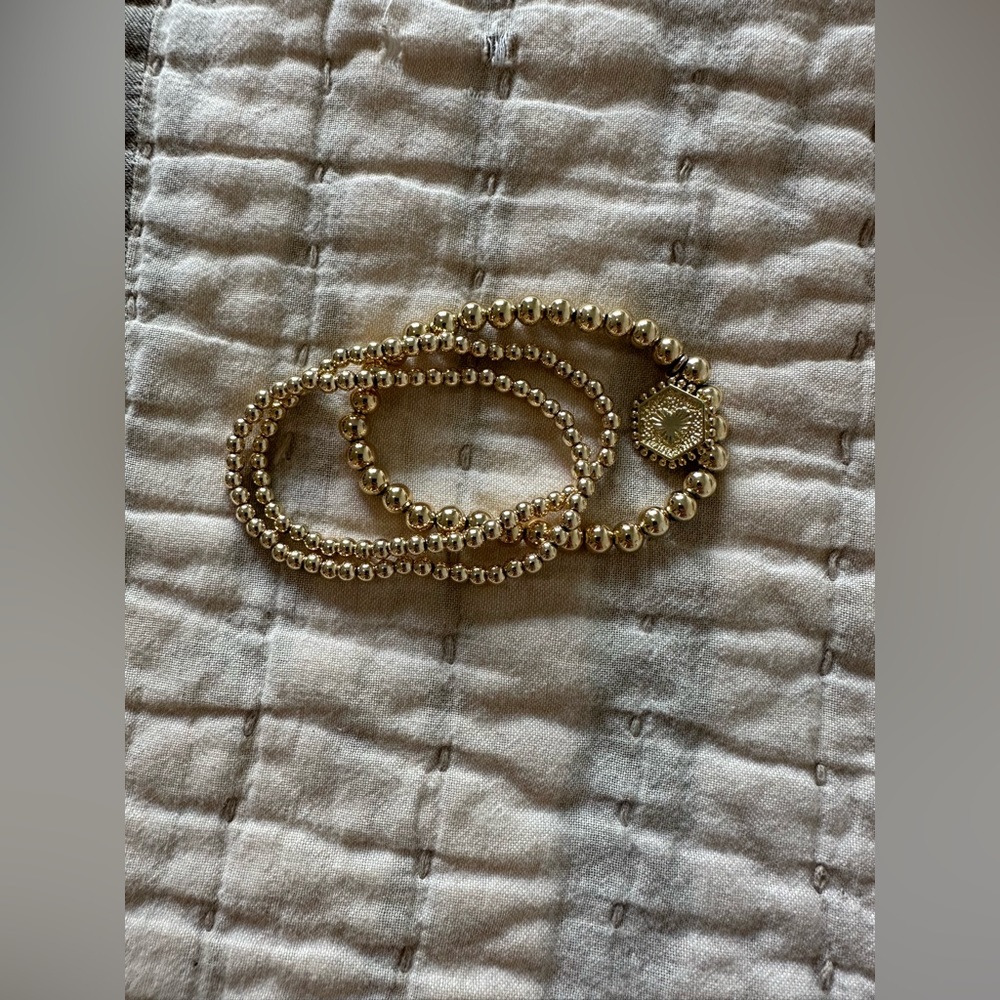 Gold bracelet with letter A